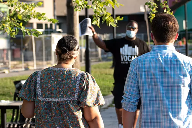 Canvassers reconvene after hitting Martin Luther King Jr. Park and Midtown Manor apartment building - PHOTO BY JACOB WALSH