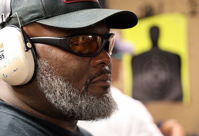 Mark Cochran, a former sergeant with the Monroe County Sheriff's Office, is the chief instructor for the Rochester African American Firearms Association. - PHOTO BY MAX SCHULTE