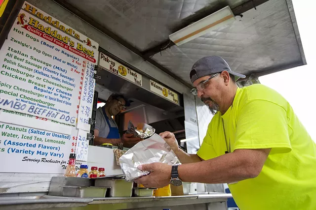 George Haddad, whose stand is outside of the county courthouse and jail and BlueCross Arena, often serves people who are having the best and worst days of their lives. - PHOTO BY LAUREN PETRACCA