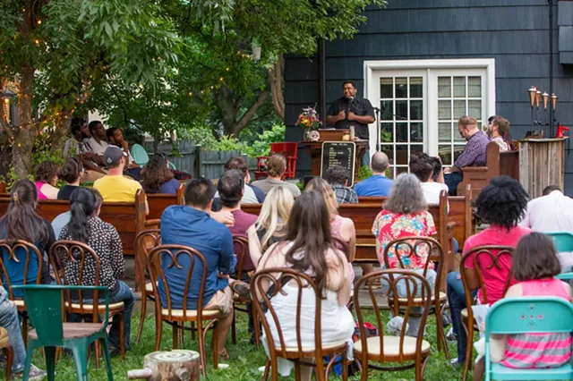 Ohio poet Scott Woods was a featured reader at the July 11 event. - PHOTO BY JOHN SCHLIA
