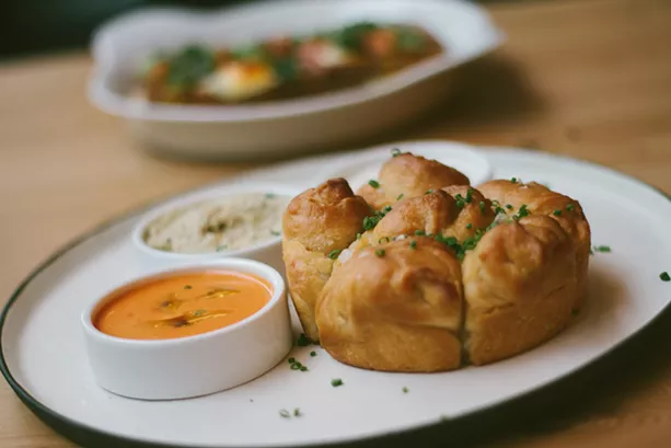 Radio Social's Kubaneh "pull-apart" bread. - PHOTO BY KEVIN FULLER
