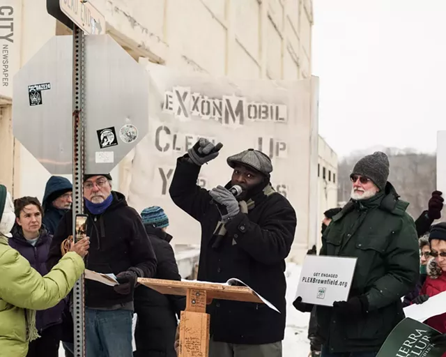 PLEX Neighborhood Association Vice President Dorian Hall calls for the properties in the Vacuum Oil Brownfield Opportunity Area to be thoroughly cleaned up. - PHOTO BY JEREMY MOULE