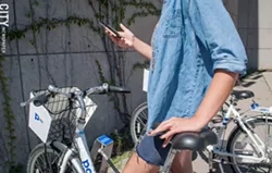 Bicycles in the Pace bike share system must be unlocked using a Bluetooth-enabled smartphone. But not everyone has or can afford a smartphone, so some people are unable to access and use the bikes. - PHOTO BY JACOB WALSH