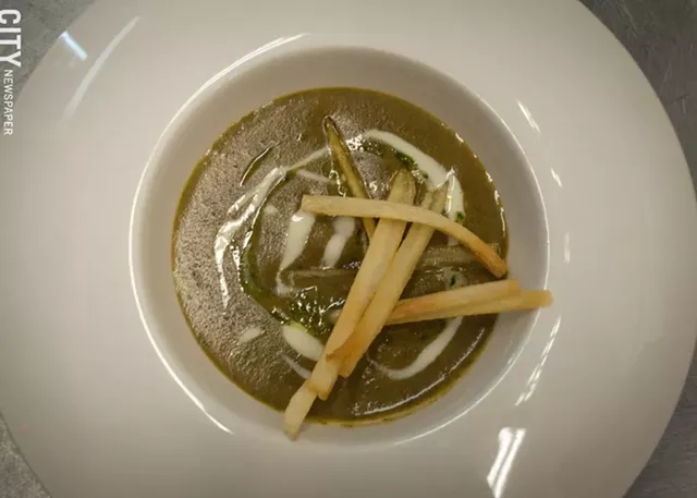 The warming poblano chile soup, served in the "spaceship bowls" at Atlas Eats. - PHOTO BY REBECCA RAFFERTY