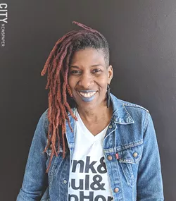 Reenah Golden, artist and owner of The Avenue Blackbox Theatre, says that the cultural demographics of the city are not properly considered in arts funding discussions. - PHOTO BY KURT INDOVINA