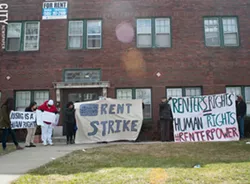 Tenants at 967 Chili Avenue during a rally last year to protest the poor conditions of their building. - FILE PHOTO