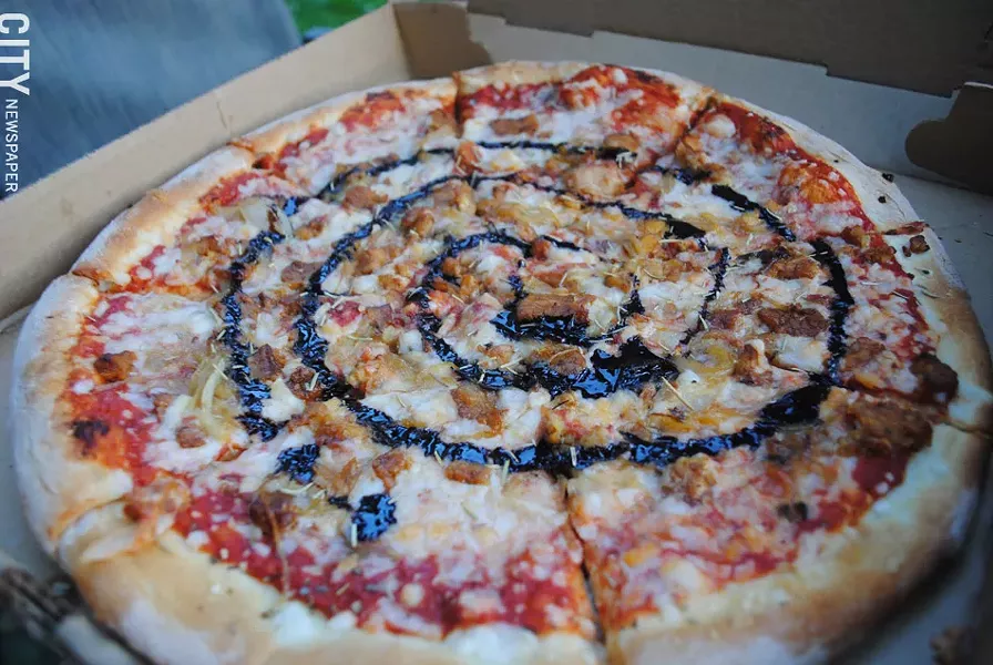 The Uncle Buck pizza includes house-made tempeh bacon, caramelized onions, rosemary, and balcamic glaze. - PHOTO BY RENÉE HEININGER