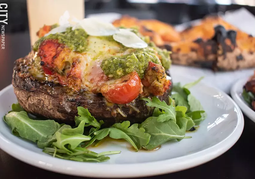 The Baked Portobello includes lobster meat, cherry tomato, mozzarella, and pesto. - PHOTO BY JACOB WALSH