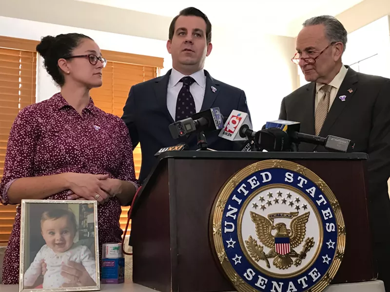 MaryBeth and Adam Gillan, center, with Sen. Charles Schumer advocating for blister packs for opioids. - PHOTO BY DAVID ANDREATTA