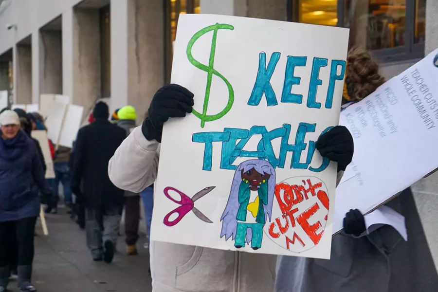 The Rochester Teachers Association organized a rally Thursday to protest proposed teacher layoffs. - PHOTO BY GINO FANELLI