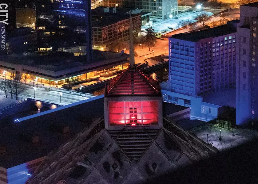 Legacy Tower was lit up in red to honor Susan B. Anthony's birthday. - PHOTO BY RYAN WILLIAMSON