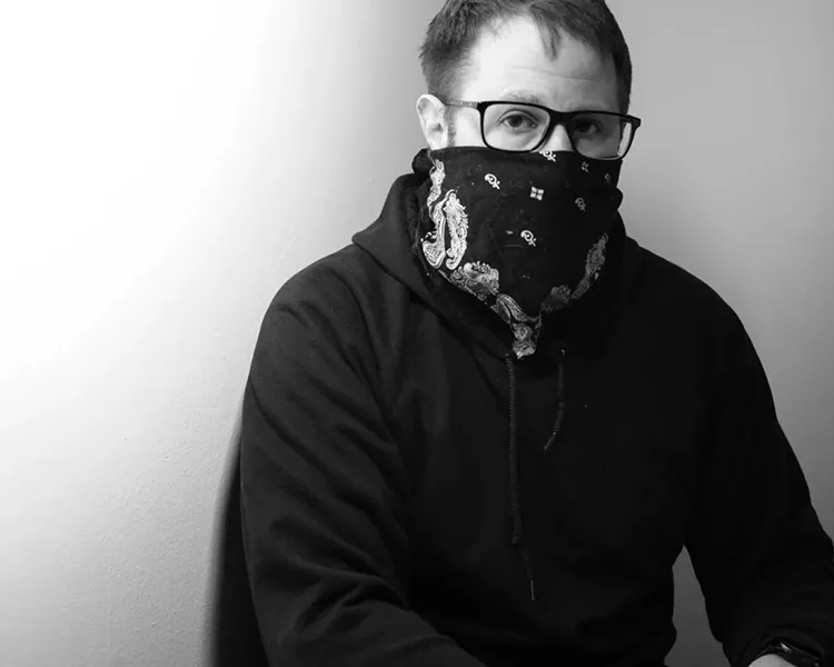 This is me, at home, trying to get used to having part of my face covered up. - PHOTO BY JEREMY MOULE