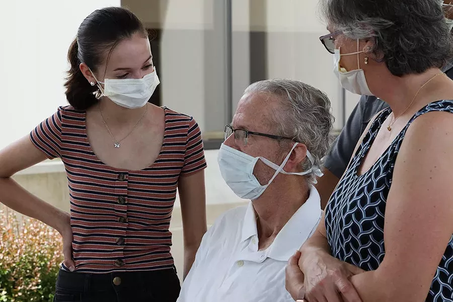 Ted O'Brien speaks with reporters outside Unity Hospital in Greece. O'Brien spent 68 days in hospitals for COVID-19 treatment. - PHOTO BY MAX SCHULTE