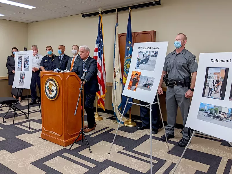 James Kennedy, U.S. Attorney for the Western District of New York, announced today that four Rochester-area residents, previously facing state charges for allegedly destroying vehicles, now face federal arson charges. - PHOTO BY JEREMY MOULE