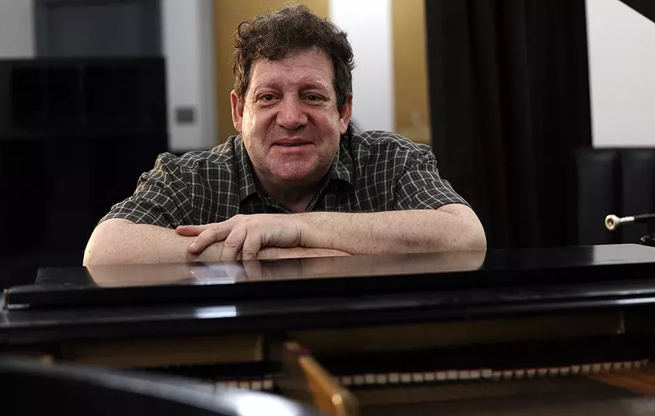 Jazz musician Jon Seiger lost his hearing when he was 32 and stopped playing music. He later had cochlear implants in both ears, taught his brain how to interpret the electronic signals and started performing again. - PHOTO BY MAX SCHULTE / WXXI NEWS