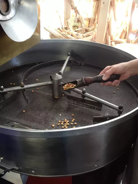 Roasting sorted-out corn kernels to be processed into white corn flour. - PHOTO PROVIDED