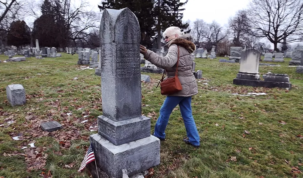 Marilyn Nolte, of the Friends of Mt. Hope Cemetery, visits the Sprague family plot. - PHOTO BY MAX SCHULTE