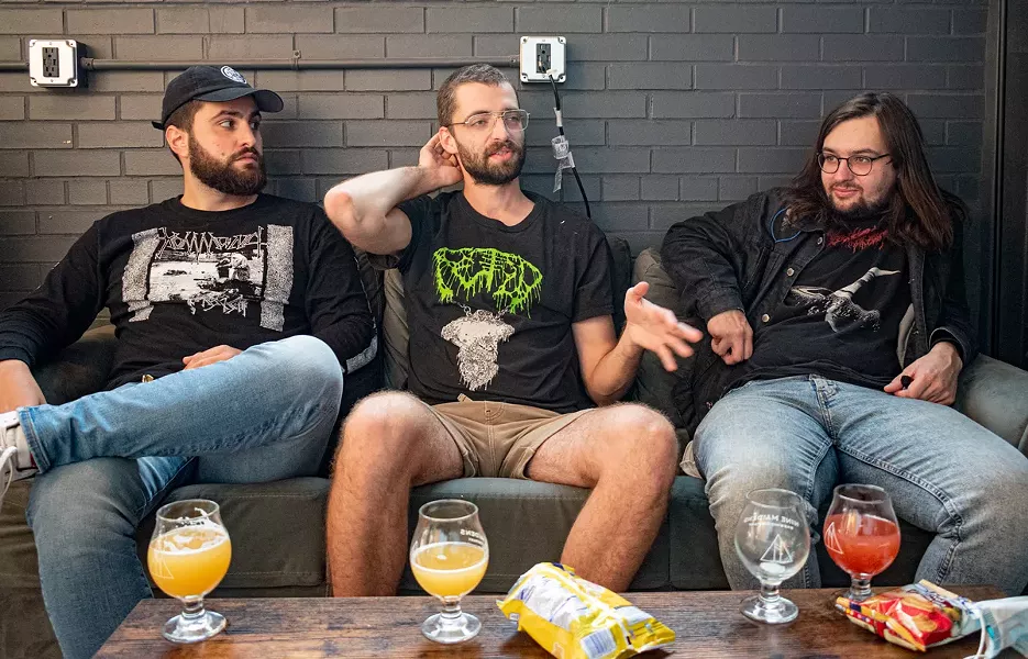 From left, vocalist Alex Jones, drummer Matt Browning, and guitarist Kyle Beam of Undeath. - PHOTO BY JACOB WALSH
