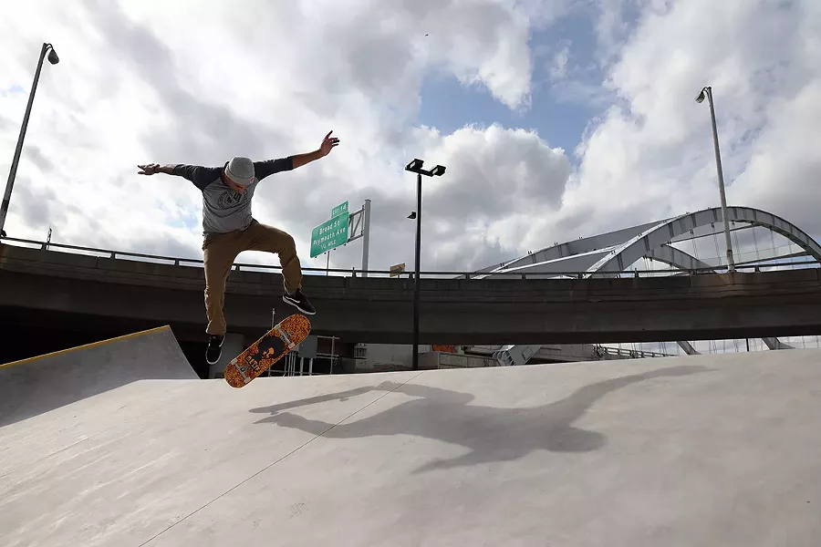 Park designer Kanten Russell skating the Roc City Skatepark on Thursday, Oct. 15. - PHOTO BY MAX SCHULTE