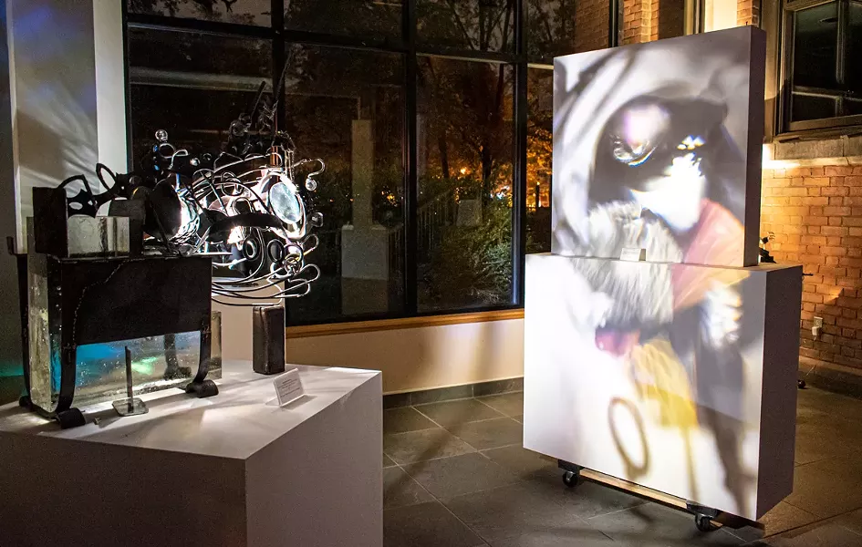 Annalisa Barron's "Place Projectors" in the atrium of Writers & Books. - PHOTOS BY JACOB WALSH