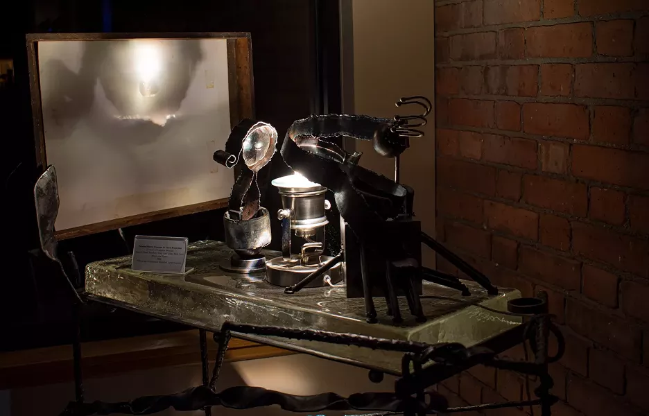 Annalisa Barron's "Place Projectors" in the atrium of Writers & Books. - PHOTO BY JACOB WALSH