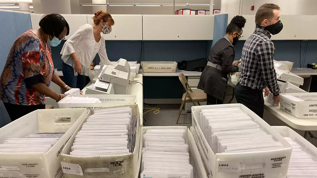 Board of Elections workers began counting ballots at 10 a.m. on Monday, Nov. 16. - PHOTO BY JEREMY MOULE