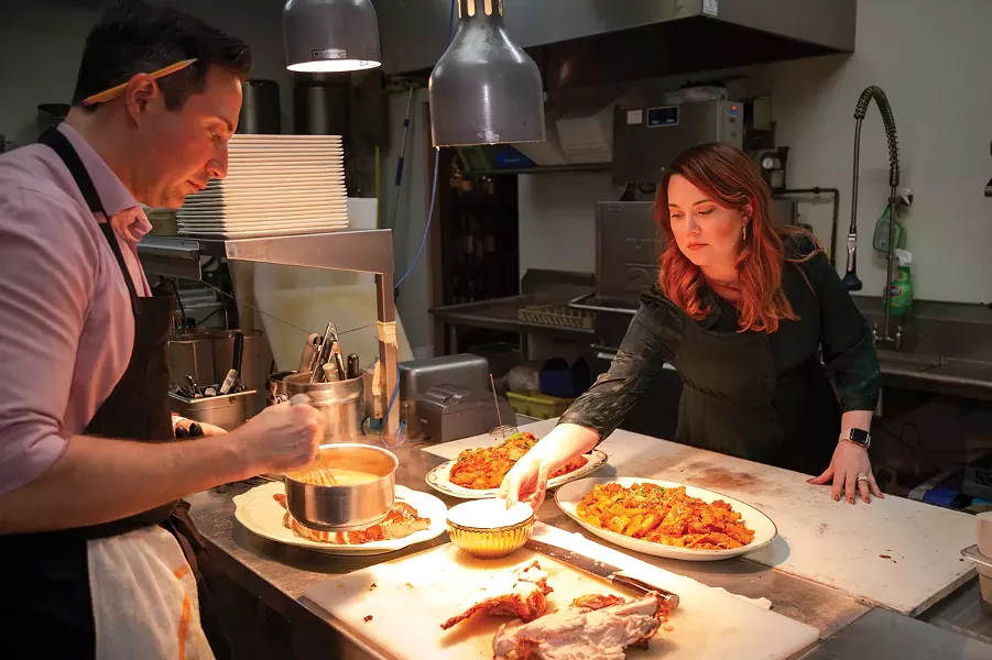 Tim and Janine Caschette prepare their annual Thanksgiving feast at their Brighton restaurant, Avvino. - PHOTO BY VINCE PRESS