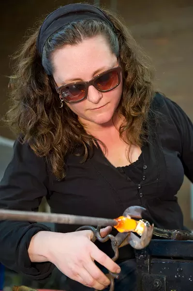 Sculptor Robin Cass (pictured) will exhibit her solo show, "Menagerie," at Axom Gallery through October 31. - PHOTO PROVIDED