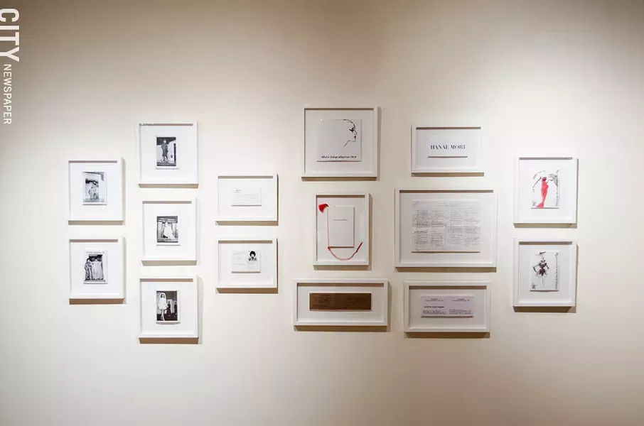 A grouping of runway images and couture show invitations. - PHOTO BY MARK CHAMBERLIN