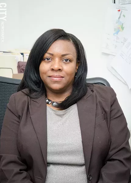 LaShay Harris, a county legislator and 19th Ward community activist, says people in her neighborhood are worried about zombie properties. - PHOTO BY MARK CHAMBERLIN