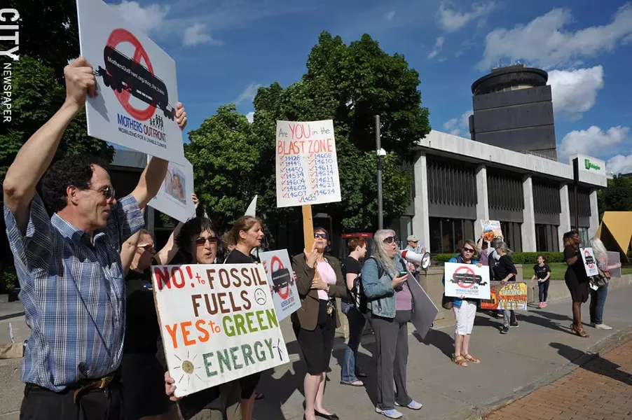 Mothers Out Front organized an oil train protest in front of the Federal Building on State Street in August. - FILE PHOTO