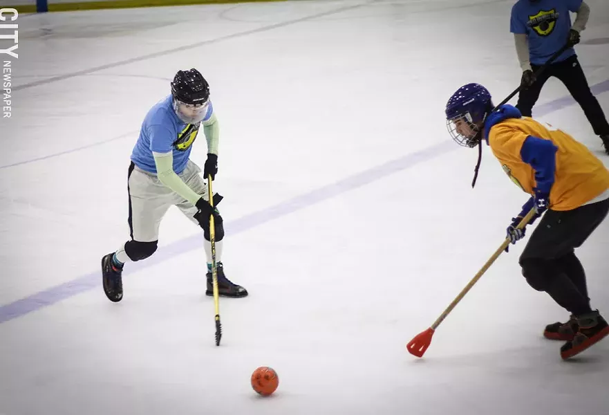 Broomball is like a cross between hockey (minus the skates) and soccer. - PHOTO BY KEVIN FULLER
