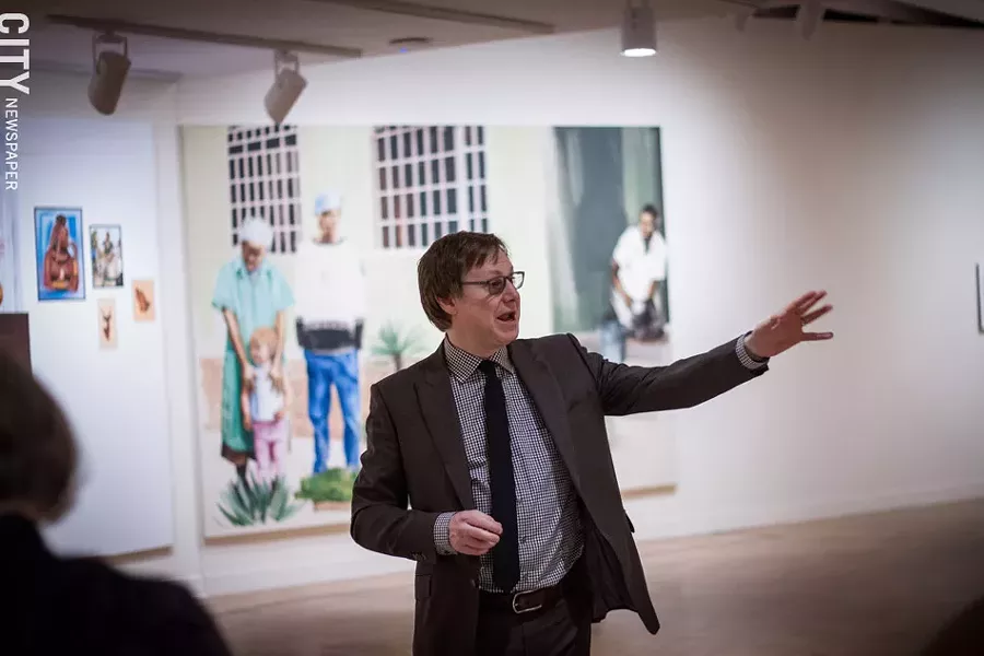 MAG Director Jonathan Binstock discusses Mokgosi's work - PHOTO BY KEVIN FULLER