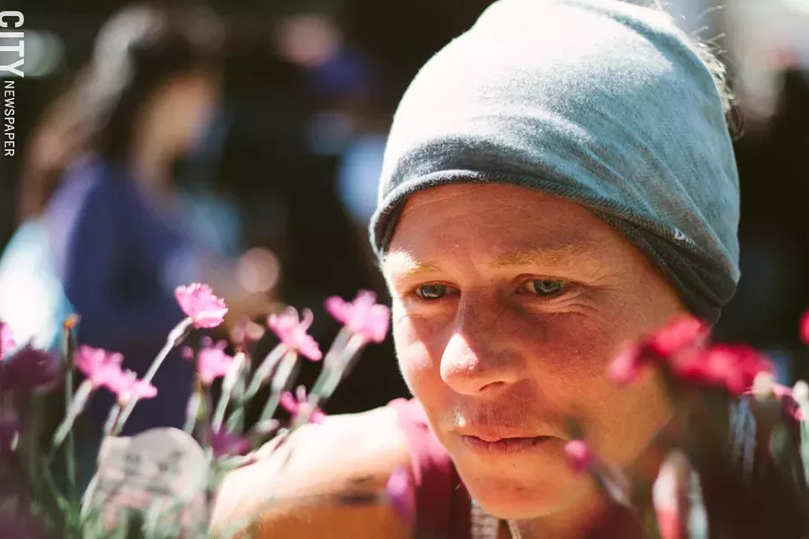 Meg Davis and her husband Paul Watson have been selling annuals, perennials, herbs, seasonal produce, and Christmas greenery at the market for nearly 10 years. Watson’s family has been a staple at the market, operating as a vendor for nearly 45 years: - “You get to make people really happy with what you provide for them. They come back again and again.” - PHOTO BY KEVIN FULLER