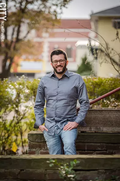 Davin Searls is part of a fourth-generation deaf family from Rochester. He is now the Executive Director of Discovering Deaf Worlds, which works with deaf community leaders around the globe. - PHOTO BY JOSH SAUNDERS
