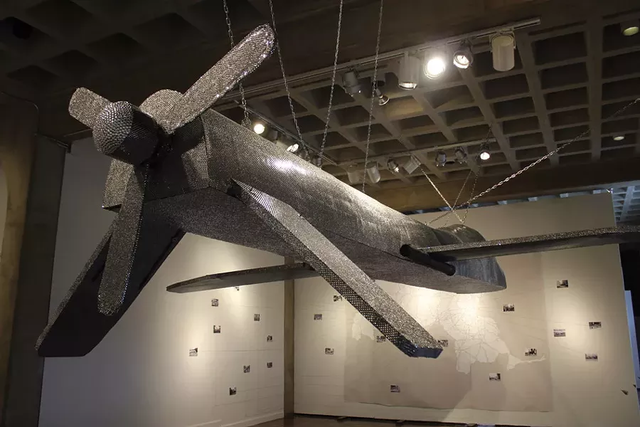 The center of Layton and Bailey's 2013 warfare-critiquing "Home Drone" exhibit was an18-foot-long rhinestone-covered replica of a U.S. Predator drone. - PROVIDED PHOTO