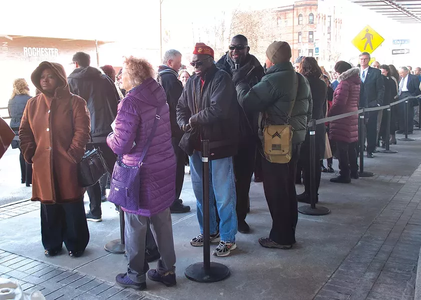 People began to line up outside of Eastman Theatre around 9 a.m. to attend the 11 a.m. funeral service for Louise Slaughter. - PHOTO BY RENÉE HEININGER