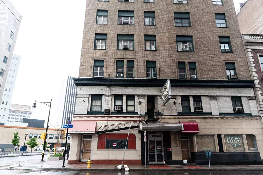 The Hotel Cadillac's owner has secured doors and windows on the building's first floor, and posted no trespassing signs. - PHOTO BY JEREMY MOULE