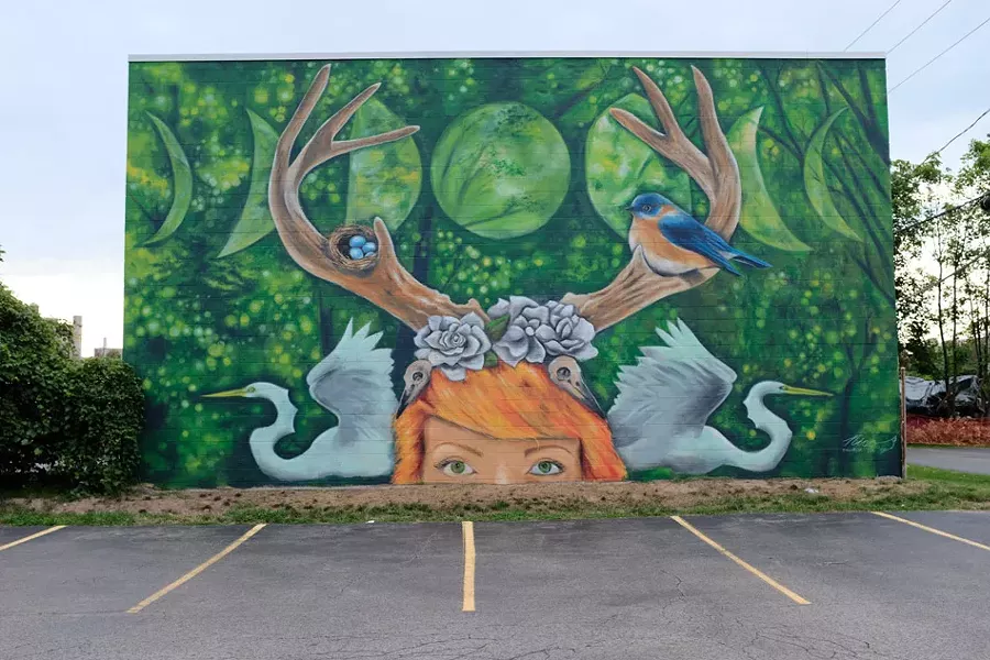 Mural by Nico Cathcart facing Planned Parenthood. - PHOTO BY JON GARY