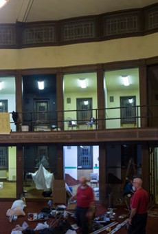 Installation view of the panopticon of reading rooms at Lyric Theatre, which have temporarily been transformed by a group of regional artists.