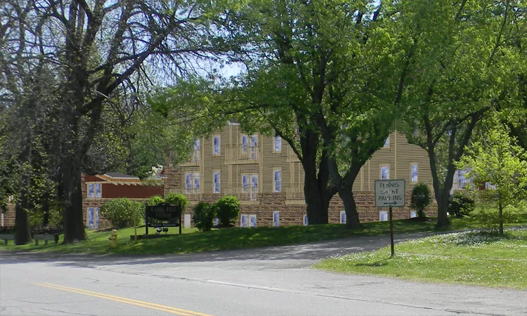 Rochester Management's new plans calls for two-and three-story buildings. - ROCHESTER MANAGEMENT
