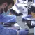 A University of Rochester lab worker examines samples. A University of Rochester lab worker examines samples.