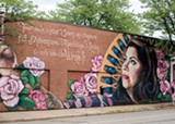 PHOTO BY RYAN WILLIAMSON - Sarah Rutherford's powerful mural of poet Rachel McKibbens adorns the street-facing wall of Planned Parenthood on University Avenue. McKibbens will partake in the "Depatriarchalizing" event held there on July 10.