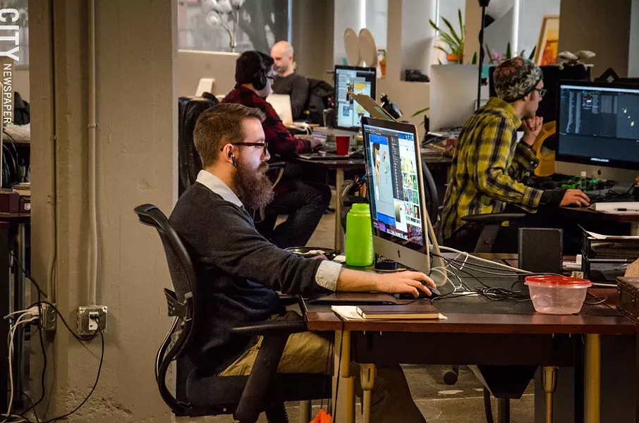 Video game developer Workinman usually has eight to 12 games in the works at any given time. - PHOTO BY MARK CHAMBERLIN