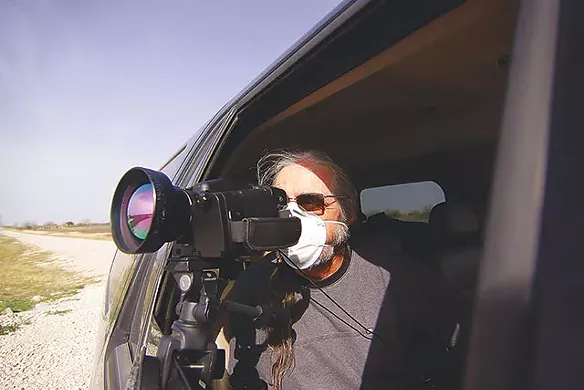 An anti-fracking activist shoots infared video in Karnes County in early March - MICHAEL BARAJAS