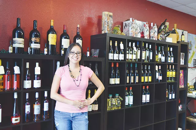 No wonder Barretto’s smiling, not a bottle over $30 in her entire store - JESSICA ELIZARRARAS