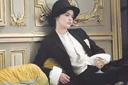 Over a cocktail, Audrey Tautou ponders the next article of clothing to abduct from her lover’s closet.