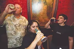 Patrons enjoy the libations and very fine art at the What’s It To Ya Lounge.