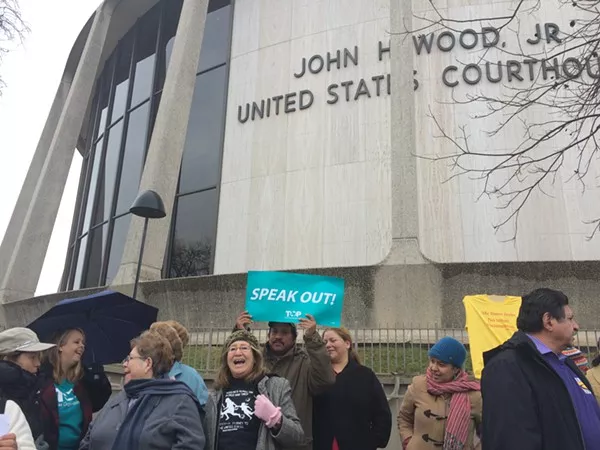 Groups call on Greg Abbott and the state to drop the lawsuit against President Barack Obama's immigration executive action. - ALEXA GARCIA-DITTA