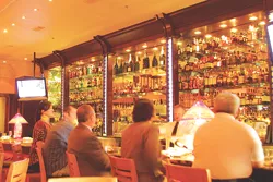 The bar, and humidor, are fully stocked at Kirby's Steakhouse